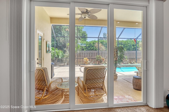 143 Sanibel Way, Melbourne Beach, FL 32951 - entryway featuring a sunroom, a ceiling fan, and plenty of natural light