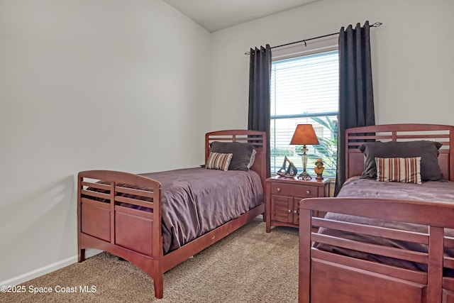 143 Sanibel Way, Melbourne Beach, FL 32951 - bedroom with carpet flooring and baseboards