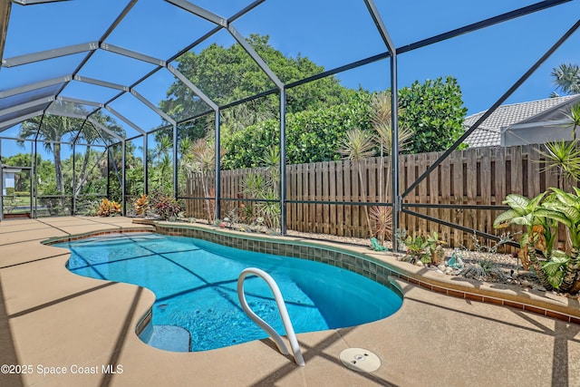 143 Sanibel Way, Melbourne Beach, FL 32951 - view of pool featuring a fenced backyard, a patio, and a lanai