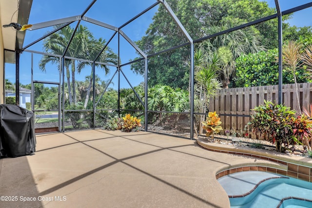143 Sanibel Way, Melbourne Beach, FL 32951 - view of patio / terrace featuring glass enclosure and a grill