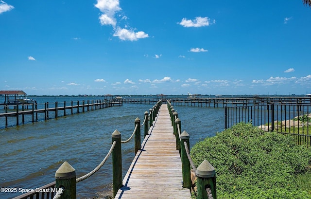 143 Sanibel Way, Melbourne Beach, FL 32951 - dock with a water view