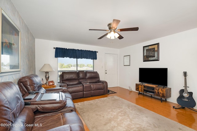 1515 Huntington Ln Unit 423, Rockledge, FL 32955 - living room with wood finished floors and a ceiling fan