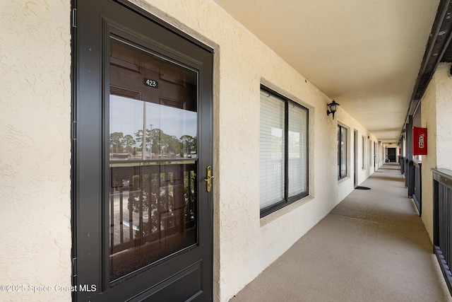 1515 Huntington Ln Unit 423, Rockledge, FL 32955 - doorway to property featuring stucco siding