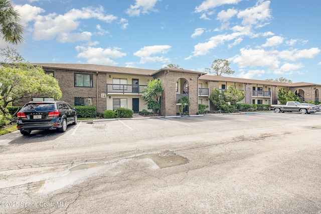 1515 Huntington Ln Unit 423, Rockledge, FL 32955 - view of property with uncovered parking