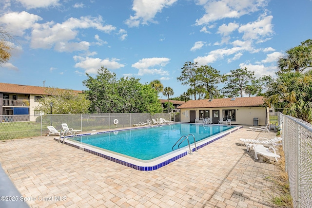 1515 Huntington Ln Unit 423, Rockledge, FL 32955 - community pool featuring a patio