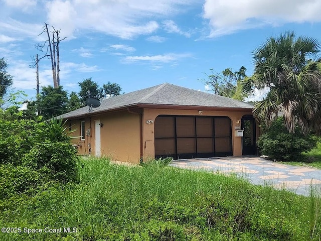 17311 Harris Ave, Port Charlotte, FL 33948 - garage with driveway