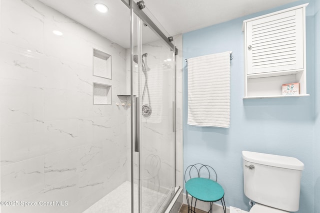 2815 S Atlantic Ave Unit 606, Cocoa Beach, FL 32931 - bathroom featuring a marble finish shower and recessed lighting