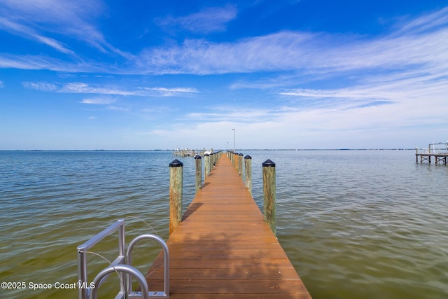 2815 S Atlantic Ave Unit 606, Cocoa Beach, FL 32931 - dock featuring a water view