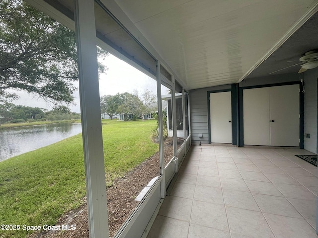 4670 Beck Lake Trl Unit 1-119, Melbourne, FL 32901 - unfurnished sunroom with a water view and ceiling fan