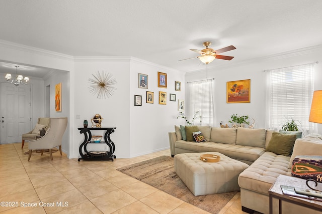 758 Carriage Lake Way, Vero Beach, FL 32968 - living room featuring healthy amount of natural light, crown molding, a ceiling fan, a chandelier, and light tile patterned floors