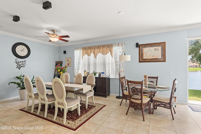 758 Carriage Lake Way, Vero Beach, FL 32968 - dining space with ornamental molding, light tile patterned floors, a ceiling fan, and a textured ceiling