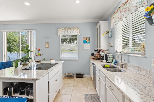 758 Carriage Lake Way, Vero Beach, FL 32968 - kitchen with black electric stovetop, a center island, light tile patterned flooring, ornamental molding, and white cabinets
