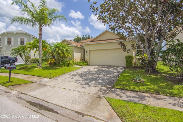 758 Carriage Lake Way, Vero Beach, FL 32968 - view of front of property with stucco siding, driveway, an attached garage, and a front lawn