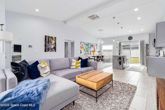 2840 Fontainebleau Ave SE, Palm Bay, FL 32909 - living room with recessed lighting and light tile patterned floors