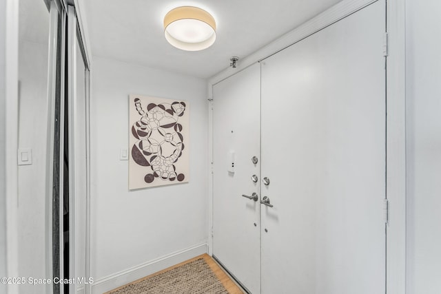 2100 N Atlantic Ave Unit 1110, Cocoa Beach, FL 32931 - entryway featuring light wood-style floors and baseboards