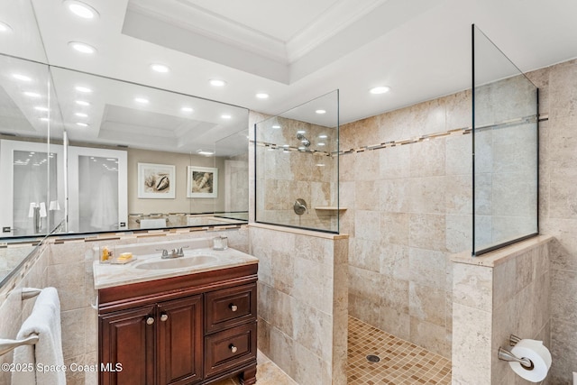 2100 N Atlantic Ave Unit 1110, Cocoa Beach, FL 32931 - bathroom featuring ornamental molding, tile walls, vanity, a walk in shower, and recessed lighting