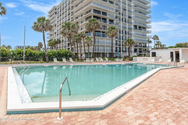 2100 N Atlantic Ave Unit 1110, Cocoa Beach, FL 32931 - community pool with a patio