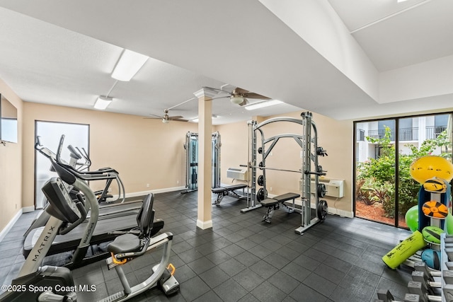2100 N Atlantic Ave Unit 1110, Cocoa Beach, FL 32931 - gym with ceiling fan and baseboards