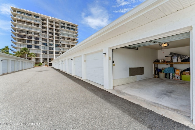 2100 N Atlantic Ave Unit 1110, Cocoa Beach, FL 32931 - garage with a garage door opener