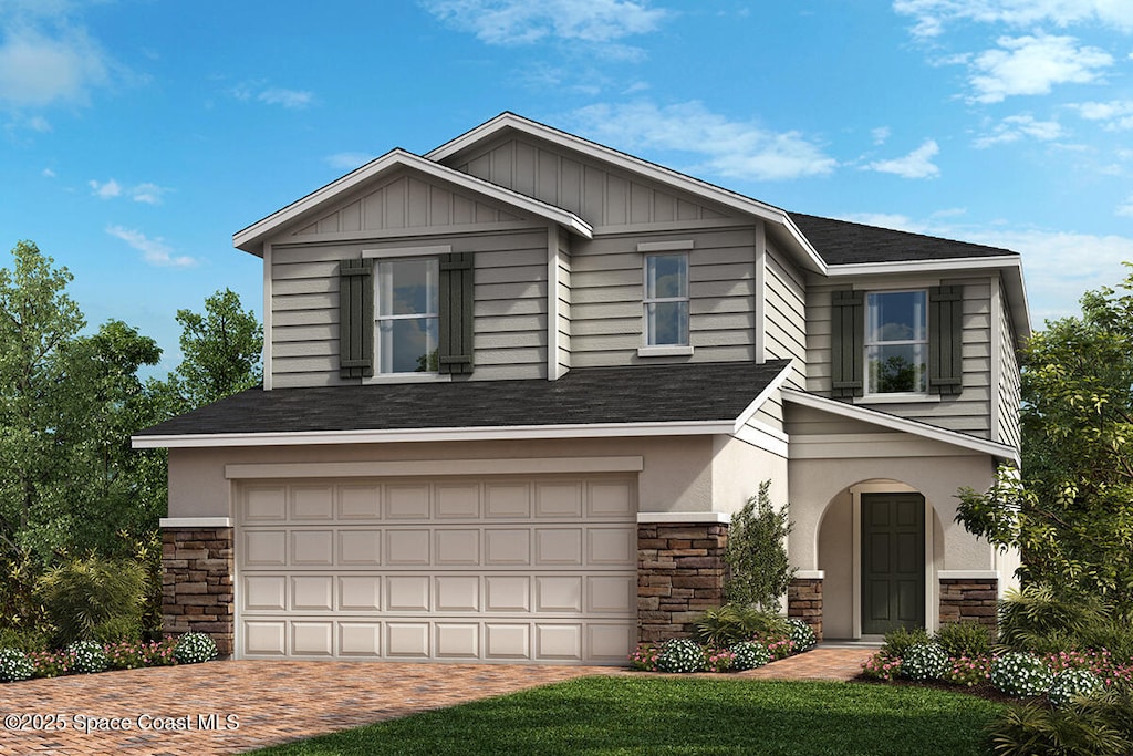3768 Grappler Cir SE, Palm Bay, FL 32909 - view of front facade with stone siding, an attached garage, driveway, and roof with shingles