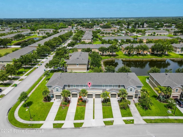2710 Revolution St Unit 104, Melbourne, FL 32935 - aerial perspective of suburban area with a large body of water