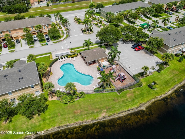 2710 Revolution St Unit 104, Melbourne, FL 32935 - aerial perspective of suburban area with a pool area