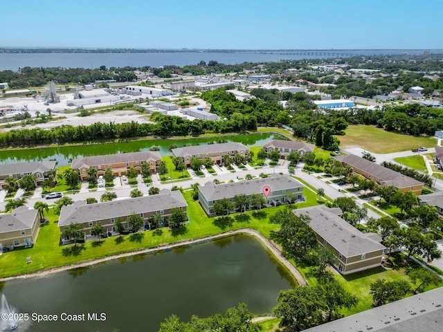 2710 Revolution St Unit 104, Melbourne, FL 32935 - aerial perspective of suburban area featuring a nearby body of water