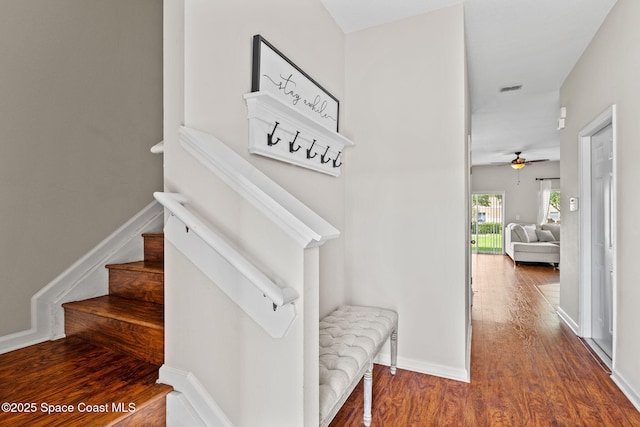 2710 Revolution St Unit 104, Melbourne, FL 32935 - staircase with a ceiling fan and wood finished floors