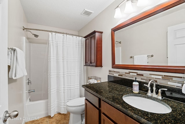 2710 Revolution St Unit 104, Melbourne, FL 32935 - bathroom featuring shower / bath combination with curtain, vanity, decorative backsplash, a textured ceiling, and tile patterned floors