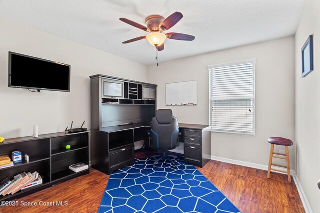2710 Revolution St Unit 104, Melbourne, FL 32935 - home office featuring ceiling fan and dark wood finished floors