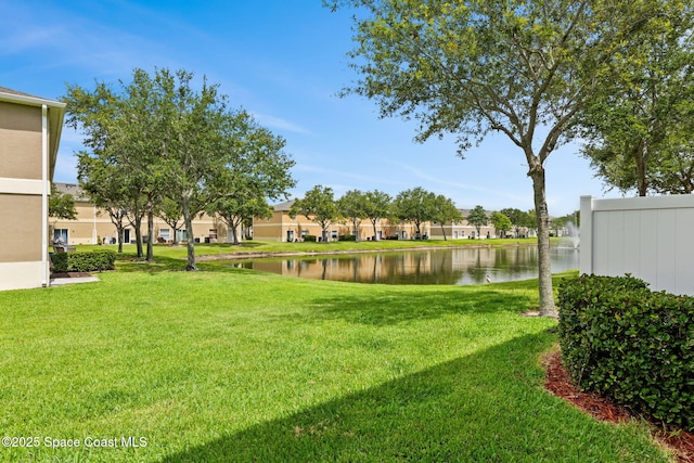 2710 Revolution St Unit 104, Melbourne, FL 32935 - view of green lawn featuring a water view and a residential view