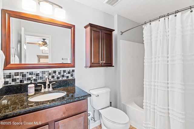 2710 Revolution St Unit 104, Melbourne, FL 32935 - full bath with vanity, shower / bathtub combination with curtain, decorative backsplash, a textured ceiling, and a ceiling fan