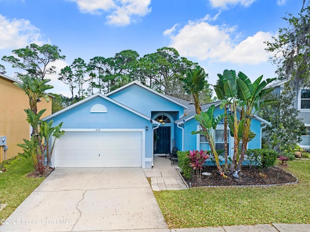 1652 La Maderia Dr, Palm Bay, FL 32908 - ranch-style house with an attached garage, driveway, stucco siding, and a front yard