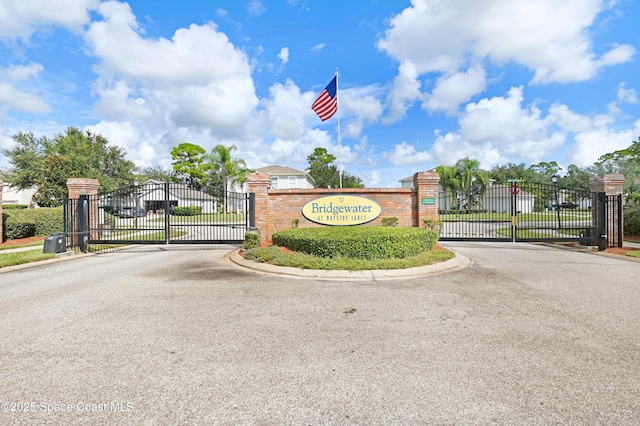 1652 La Maderia Dr, Palm Bay, FL 32908 - community / neighborhood sign featuring a gate