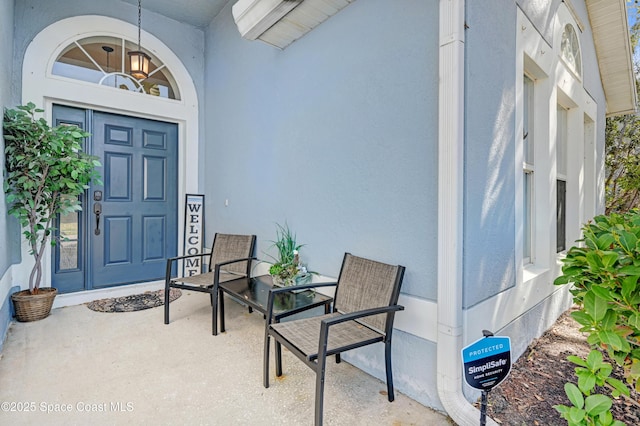1652 La Maderia Dr, Palm Bay, FL 32908 - view of exterior entry with stucco siding