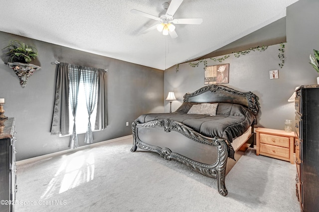1652 La Maderia Dr, Palm Bay, FL 32908 - bedroom featuring a textured ceiling, carpet, vaulted ceiling, and a ceiling fan