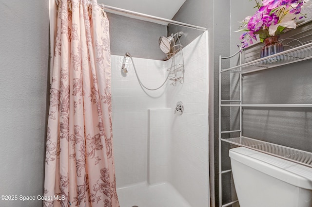 1652 La Maderia Dr, Palm Bay, FL 32908 - full bathroom with a stall shower and a textured wall