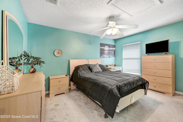1652 La Maderia Dr, Palm Bay, FL 32908 - bedroom featuring light carpet, a textured ceiling, and a ceiling fan