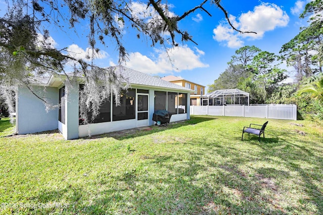 1652 La Maderia Dr, Palm Bay, FL 32908 - rear view of house featuring a sunroom