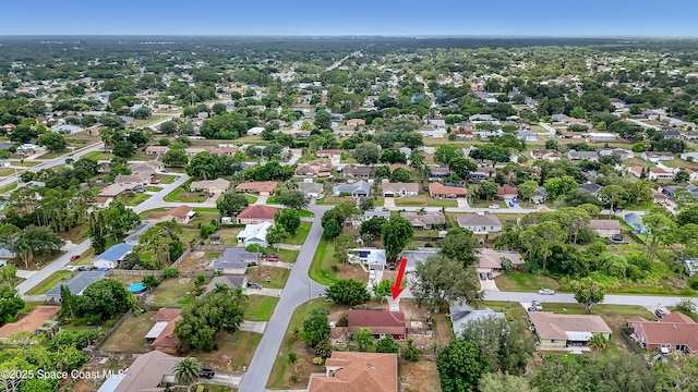 905 Spring St NW, Palm Bay, FL 32907 - aerial view of property and surrounding area with nearby suburban area