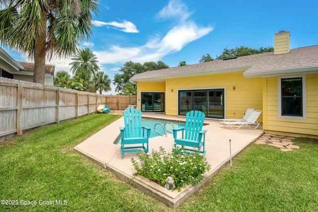 33 Yawl Dr, Cocoa Beach, FL 32931 - fenced backyard featuring a patio area