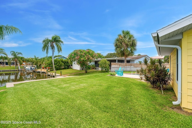 33 Yawl Dr, Cocoa Beach, FL 32931 - view of yard with a water view