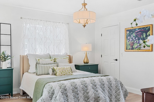 494 Fernandina St NW, Palm Bay, FL 32907 - bedroom with wood finished floors and ornamental molding