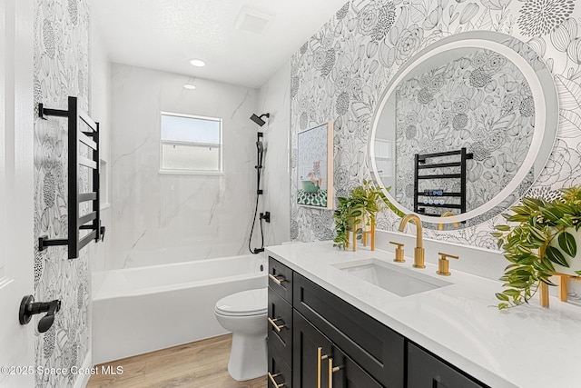 494 Fernandina St NW, Palm Bay, FL 32907 - bathroom featuring wallpapered walls, vanity, wood finished floors, and bathing tub / shower combination