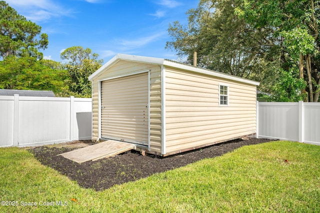 494 Fernandina St NW, Palm Bay, FL 32907 - view of shed featuring a fenced backyard