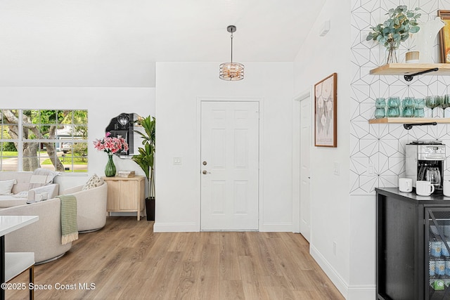 494 Fernandina St NW, Palm Bay, FL 32907 - foyer featuring light wood-style floors and baseboards