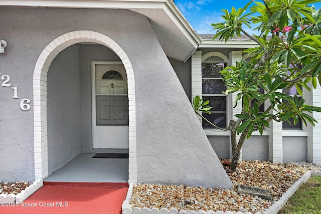 1216 Cannon St, Melbourne, FL 32935 - property entrance with stucco siding