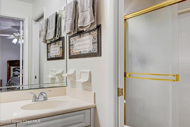 1216 Cannon St, Melbourne, FL 32935 - full bathroom with vanity, a stall shower, and a ceiling fan