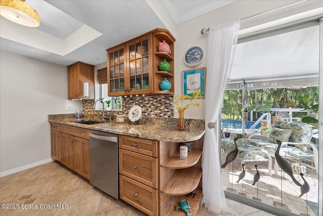 2975 Matthew Dr, Rockledge, FL 32955 - kitchen with dishwasher, open shelves, brown cabinets, backsplash, and ornamental molding