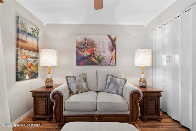 2975 Matthew Dr, Rockledge, FL 32955 - living area with ornamental molding, wood finished floors, and a ceiling fan